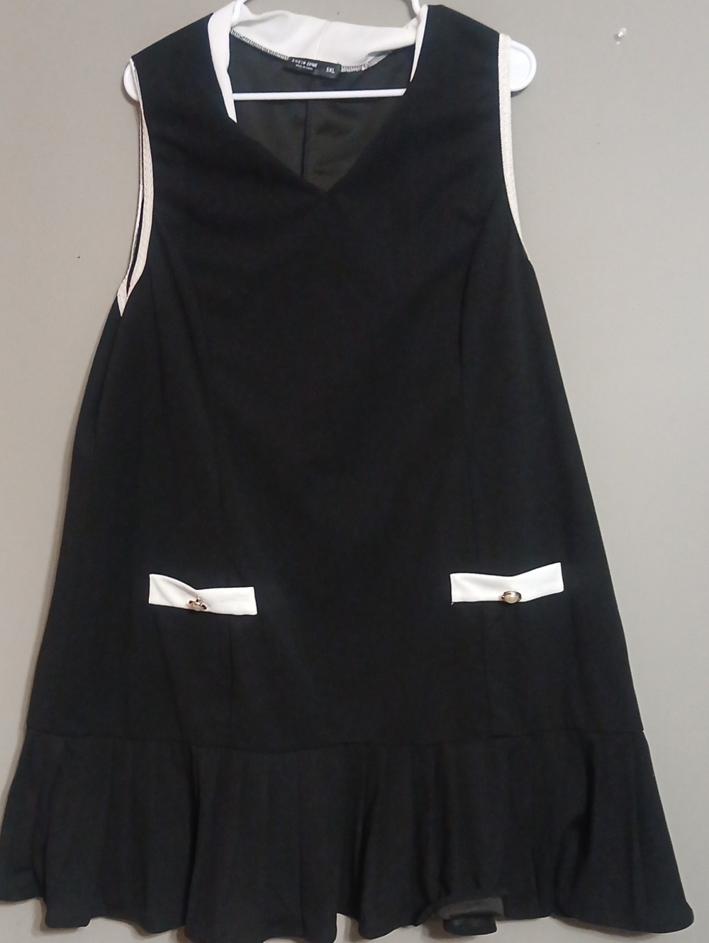 Black and White Sleeveless Ruffle Hem Dress